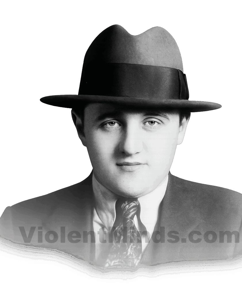 Digitally enhanced and re-rendered mugshot of Benjamin Bugsy Siegel, taken on April 12, 1928, by law enforcement during his early years as a feared enforcer and rising figure in organized crime. Known for his ties to the Italian-American Mafia and later his role in the development of Las Vegas, Siegel was already building a reputation for violence and charisma in New York’s underworld. His distinctive appearance—sharp suit, patterned tie, and trademark fedora—reflected the image of the stylish but ruthless gangster that would follow him throughout his life. This arrest predates his most infamous activities on the West Coast, where he would later become a central figure in the expansion of the Flamingo Hotel and the Las Vegas Strip.